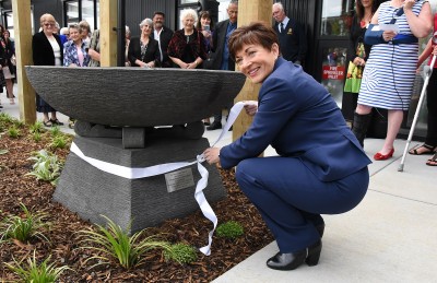 Image of Dame Patsy unveiling the plaque