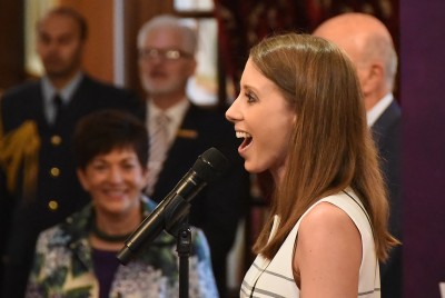 Image of Lizzie Marvelly singing the National Anthem