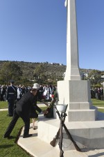 Laying a wreath at Souda Bay Commonwealth War Graves Cemetery.